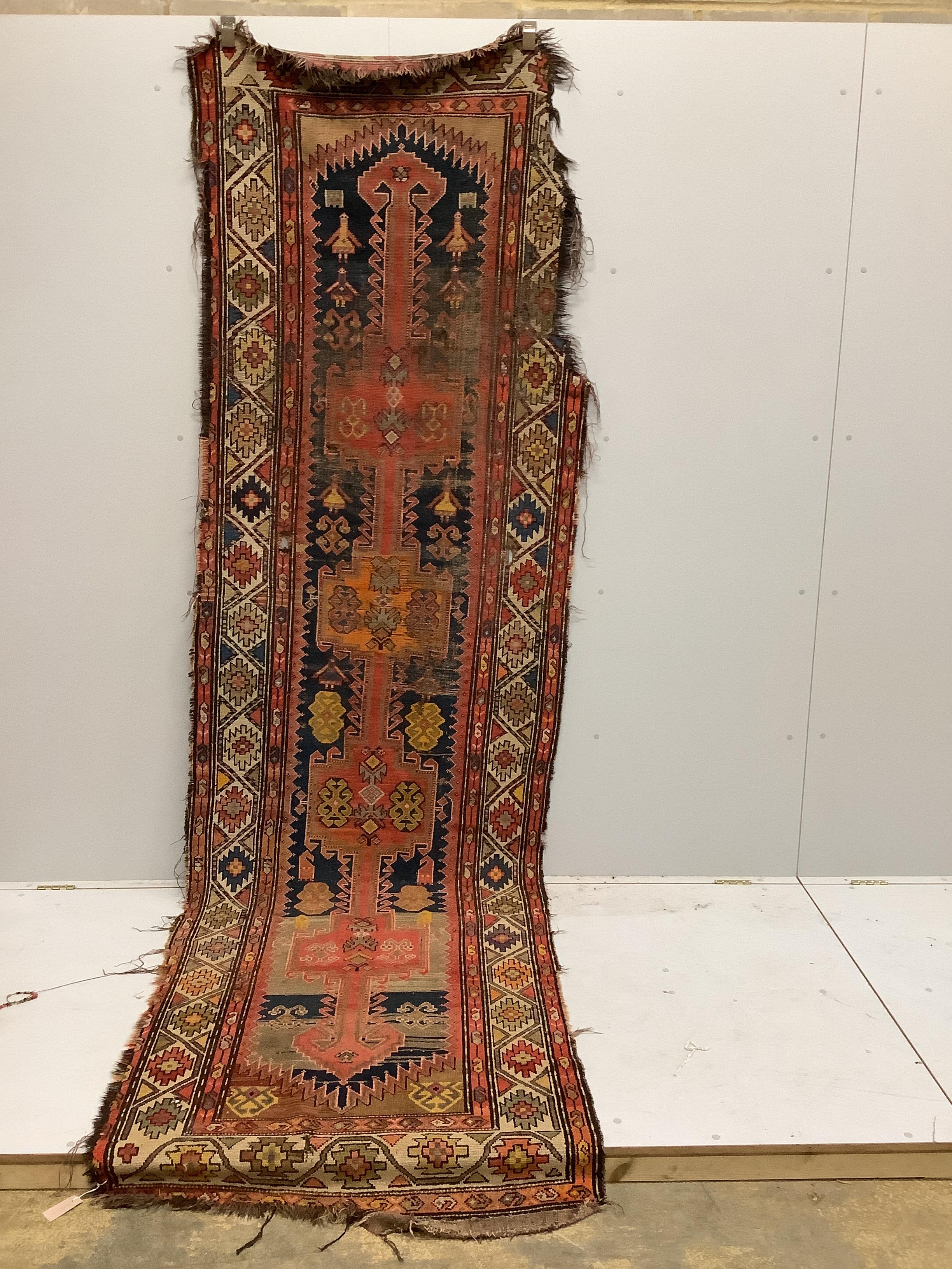 An antique Afghan runner, 350 x 104cm